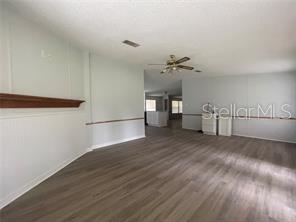 5416 Miley Road Plant City, FL 33565 - Photo 5 of 19 a view of empty room with wooden floor