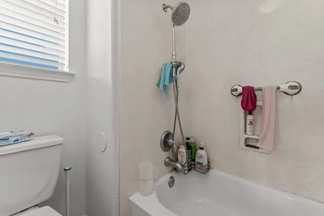 a bathroom with a sink and a toilet