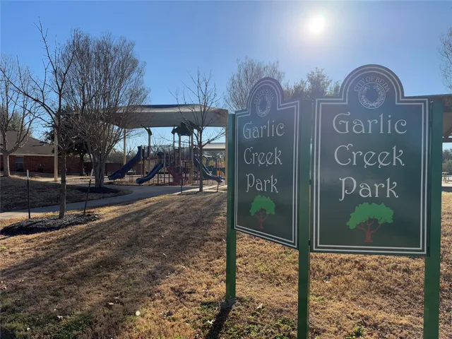 a view of swimming pool with a yard