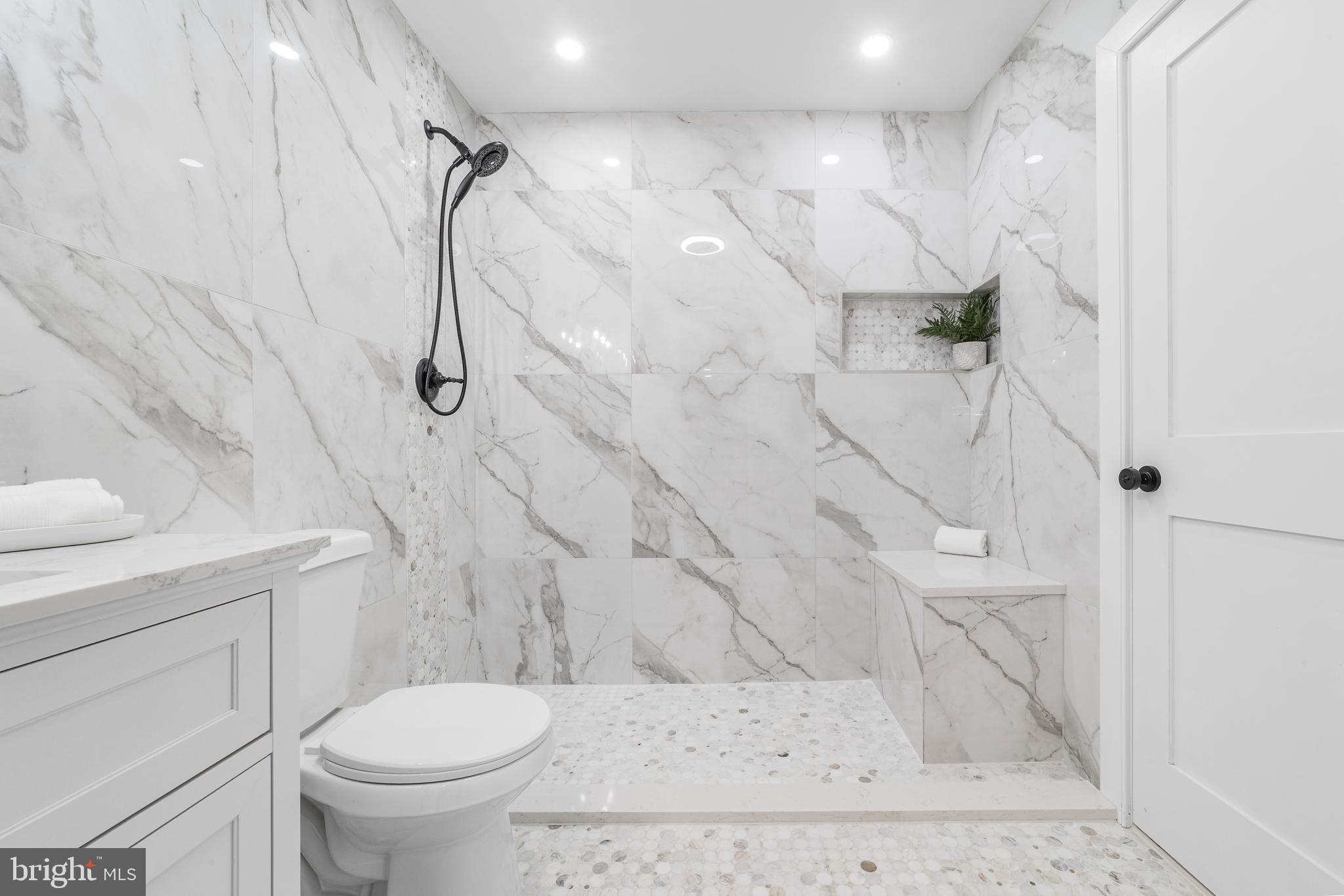 737A Prospect Road Monroe Township, NJ 08831 - Photo 21 of 28 a bathroom with a sink toilet and shower