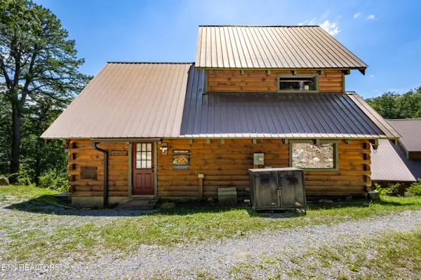 a view of a back yard of the house