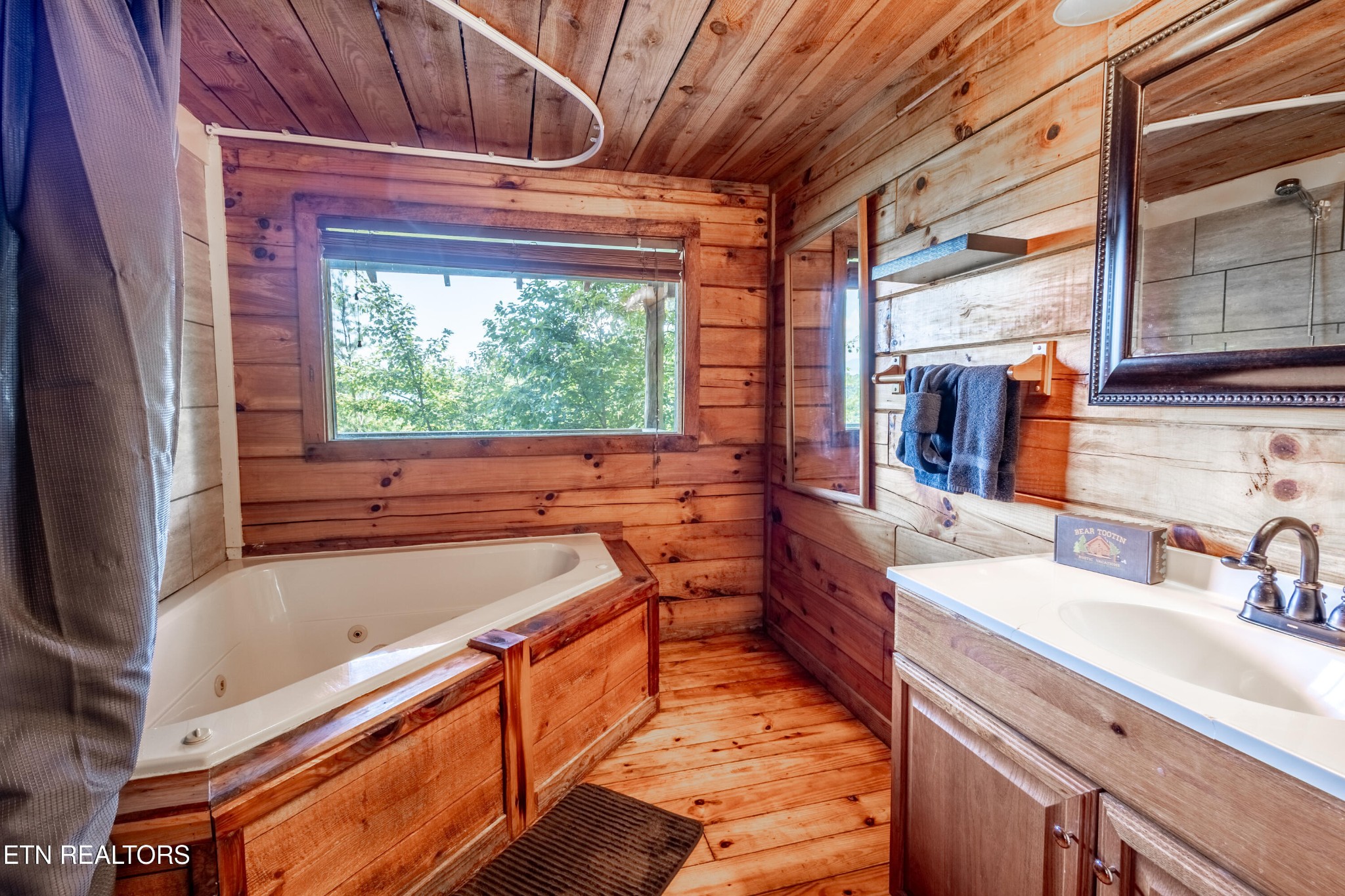 0 Lot 3r Wears Valley Road Townsend, TN 37882 - Photo 11 of 38 a bathroom with a sink and a large window