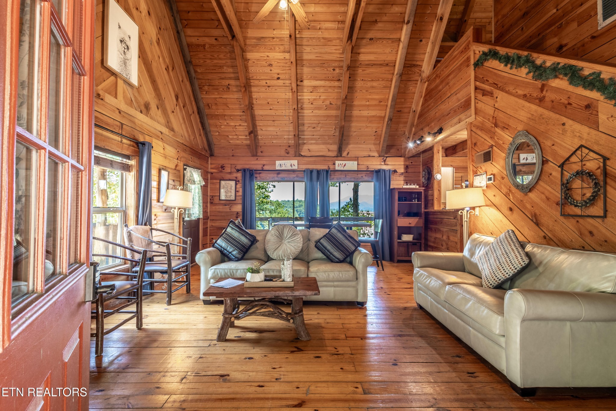 0 Lot 3r Wears Valley Road Townsend, TN 37882 - Photo 20 of 38 a living room with furniture and a wooden floor