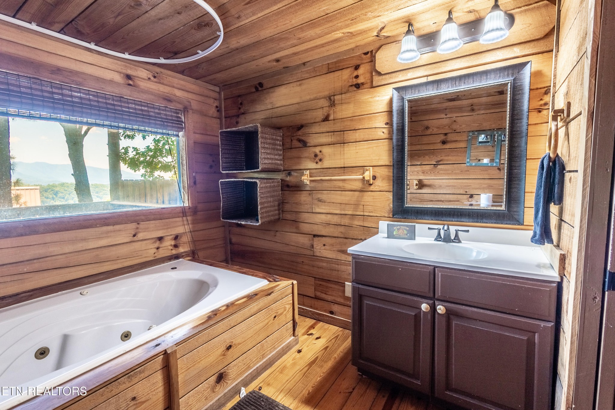 0 Lot 3r Wears Valley Road Townsend, TN 37882 - Photo 23 of 38 a bathroom with a sink and a large window
