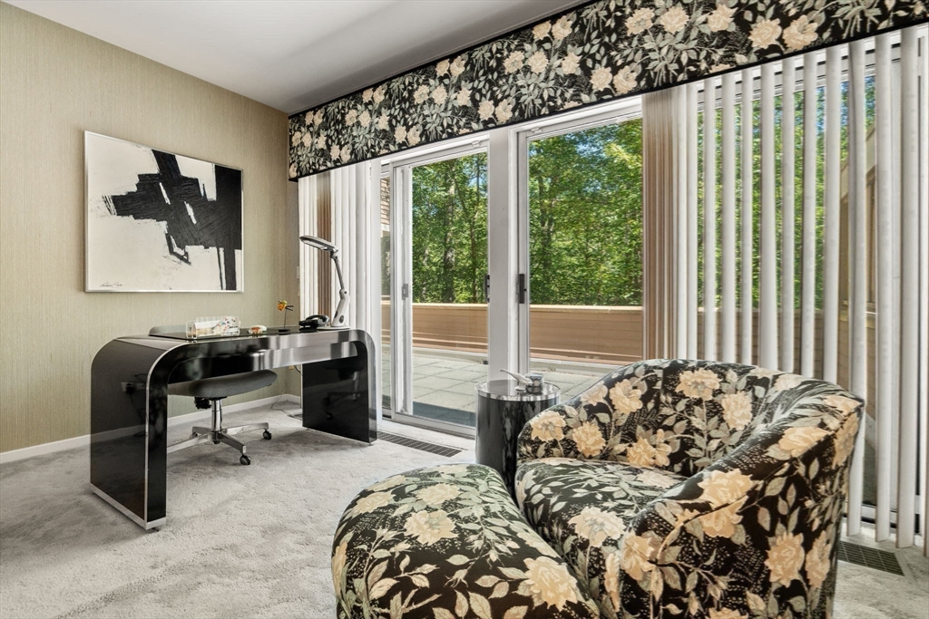 228 Allandale Road, Unit 1B Boston, MA 02467 - Photo 14 of 30 a bedroom with furniture and a large window