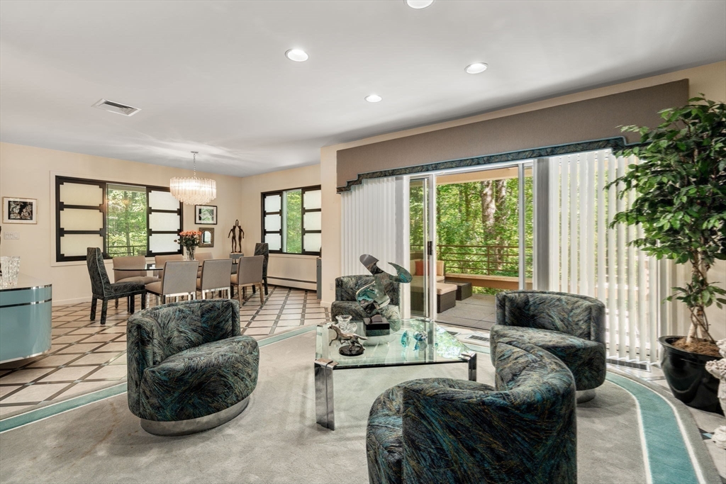 228 Allandale Road, Unit 1B Boston, MA 02467 - Photo 6 of 30 a living room with furniture and a large window