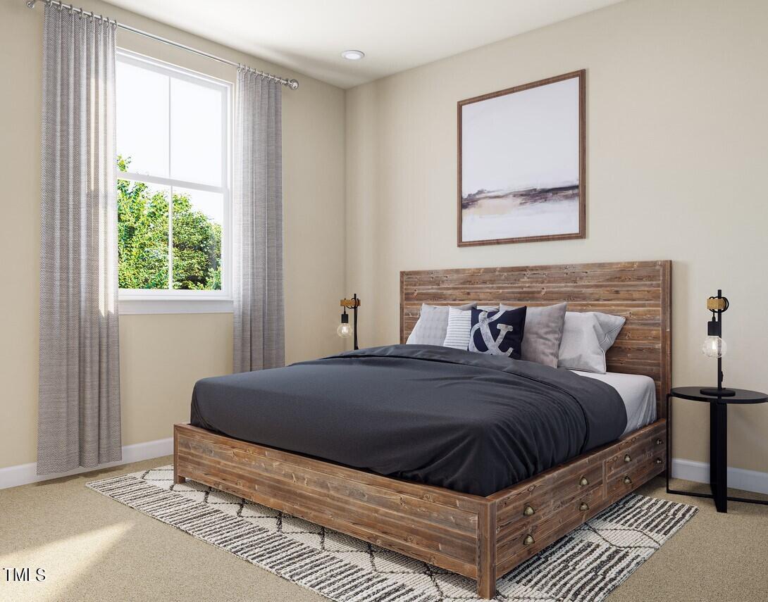 706 Hyperion Alley Wake Forest, NC 27587 - Photo 31 of 67 a bedroom with a bed and a window