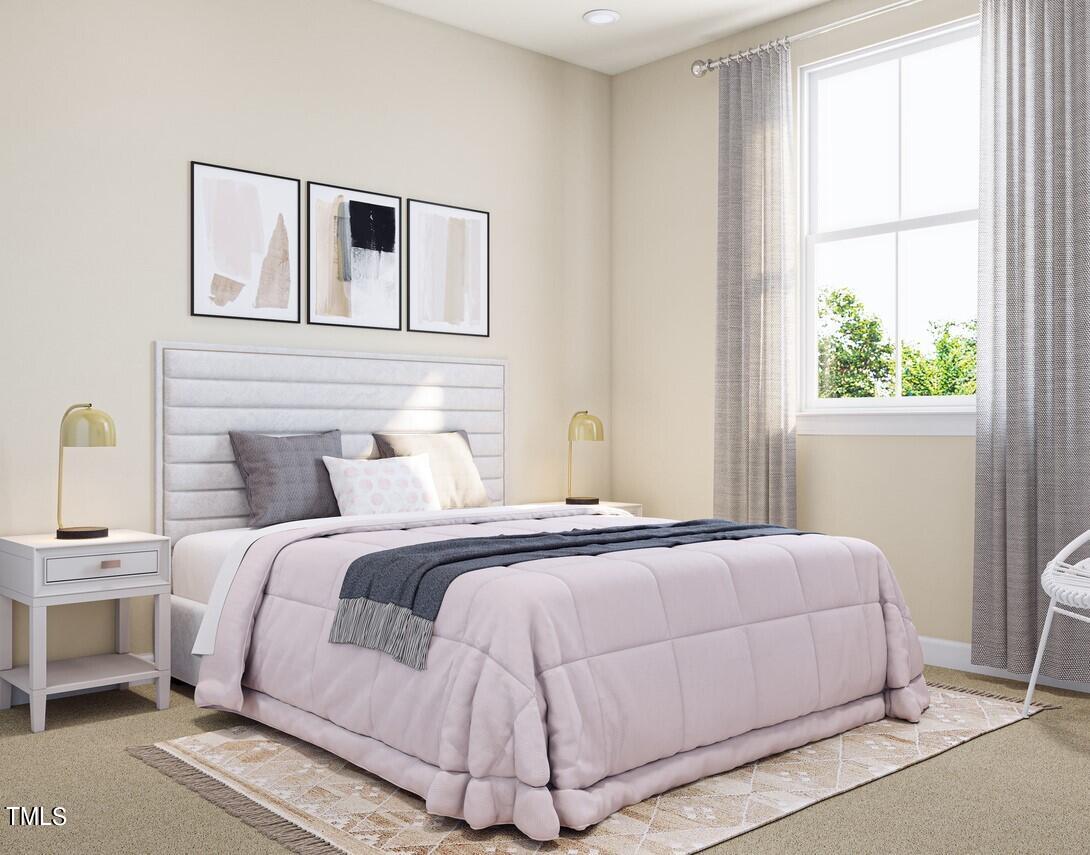706 Hyperion Alley Wake Forest, NC 27587 - Photo 32 of 67 a bedroom with a bed and a window