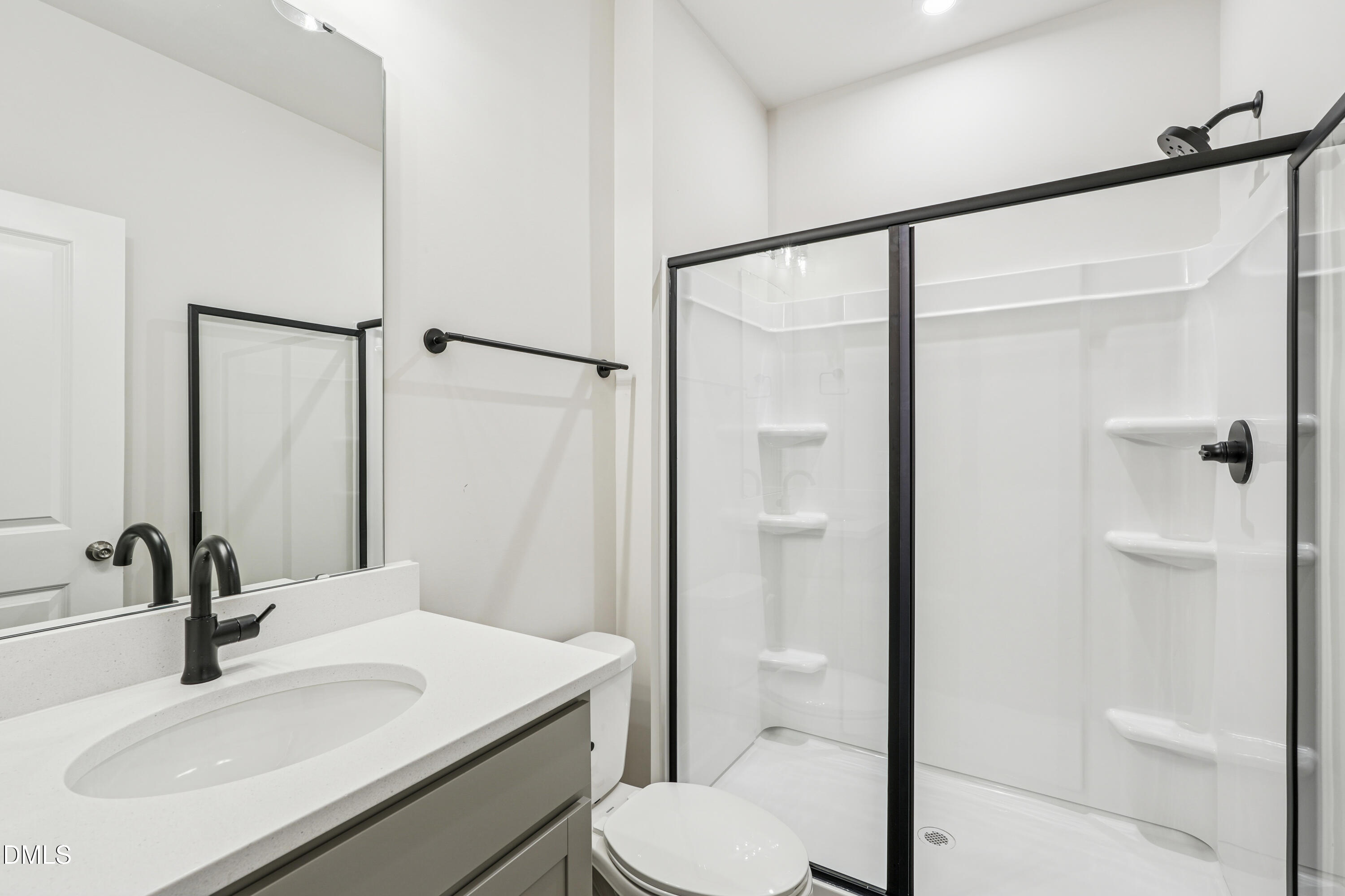 706 Hyperion Alley Wake Forest, NC 27587 - Photo 61 of 67 a bathroom with a sink toilet and shower