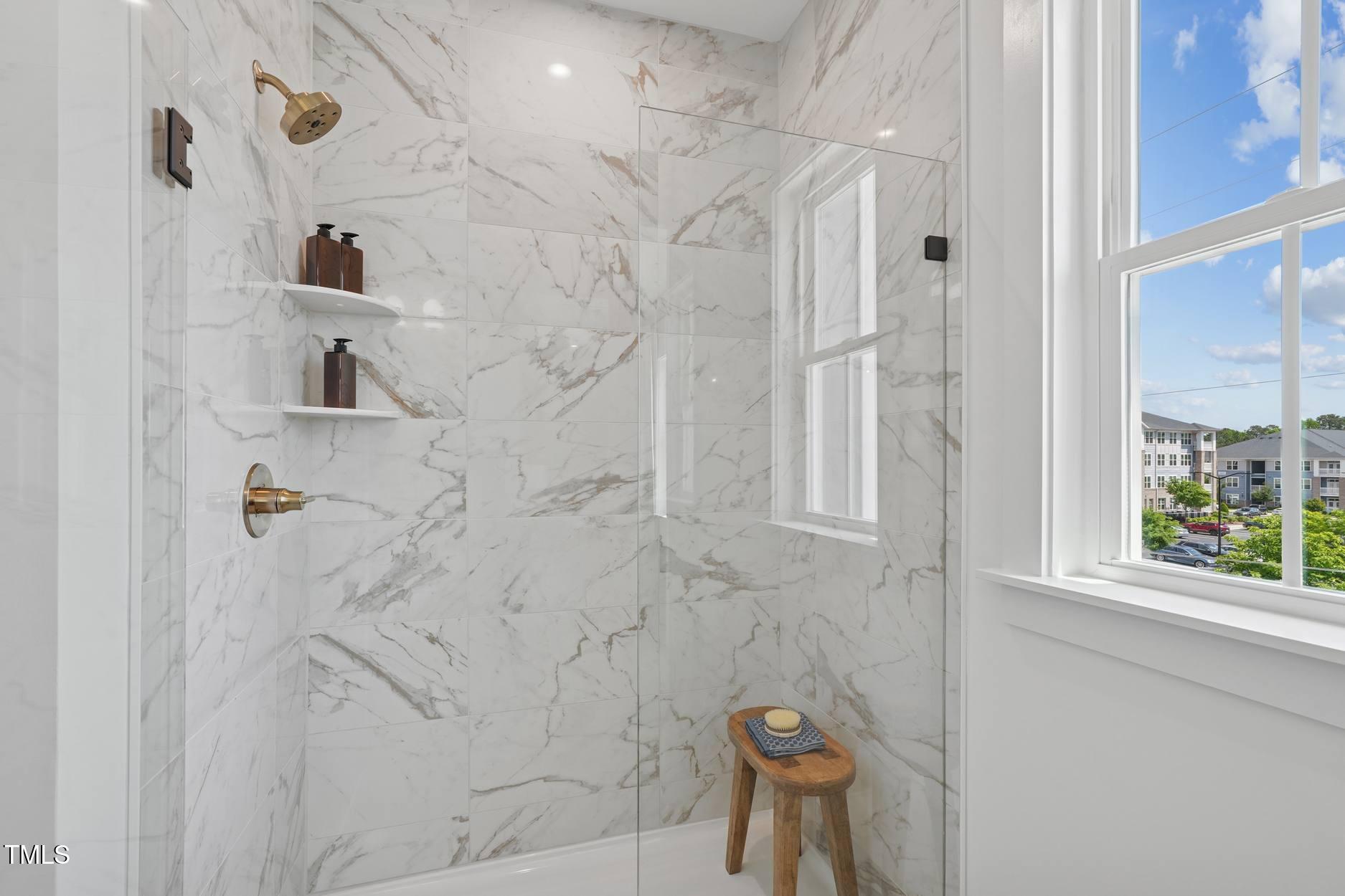 706 Hyperion Alley Wake Forest, NC 27587 - Photo 66 of 67 a bathroom with a shower and a sink