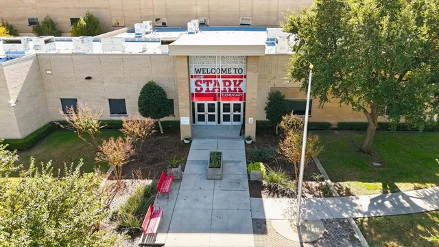 a view of a street with a building in the background