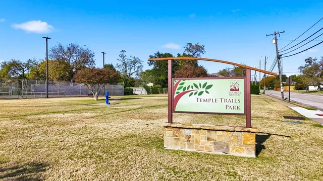 a swimming pool with outdoor seating and yard