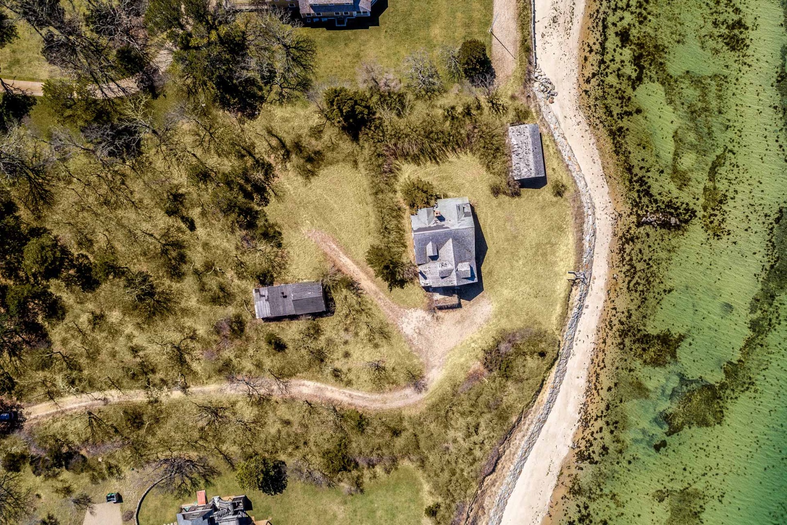 53-54 North Neck Road Edgartown, MA 02539 - Photo 7 of 8 an aerial view of a house with a yard