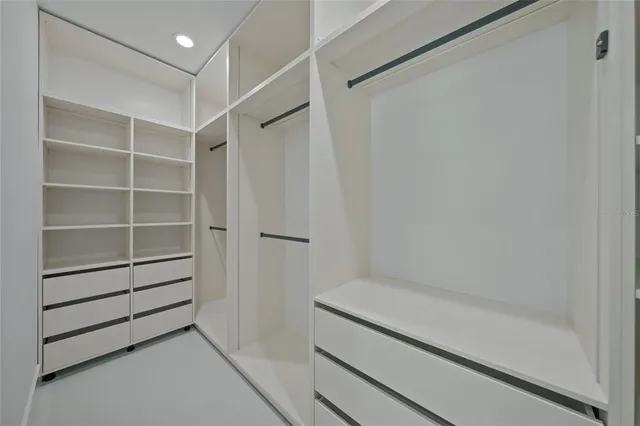 a view of a room with wooden floor and outdoor space