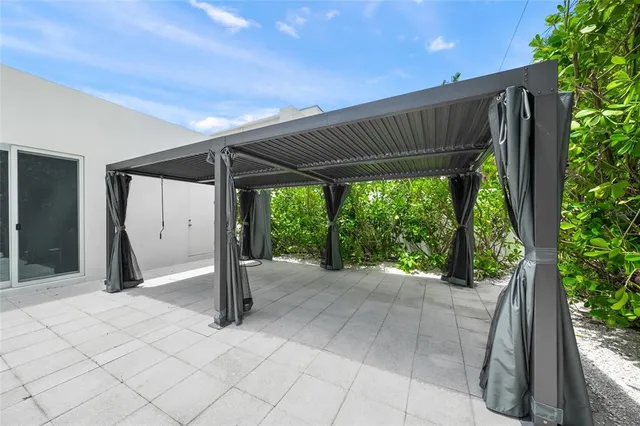 a view of a garden with a fountain