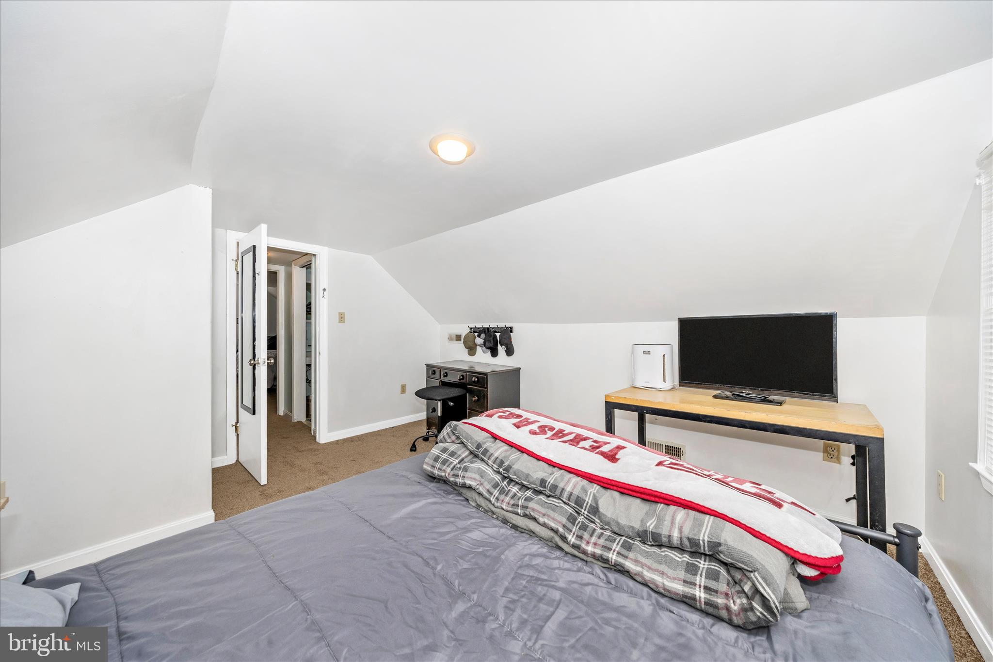 5618 Bartonsville Road Frederick, MD 21704 - Photo 29 of 53 a bedroom with bed and a flat screen tv