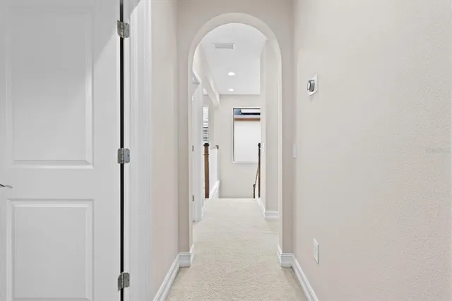 a view of a livingroom from a hallway