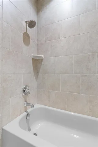 a bathroom with a sink and a shower