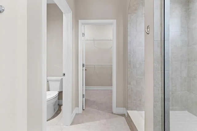 a bathroom with white walls