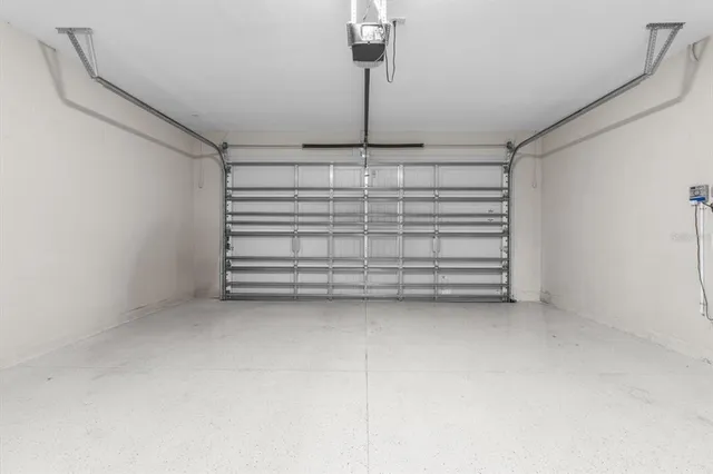 a view of a room with toys and racks on the wall