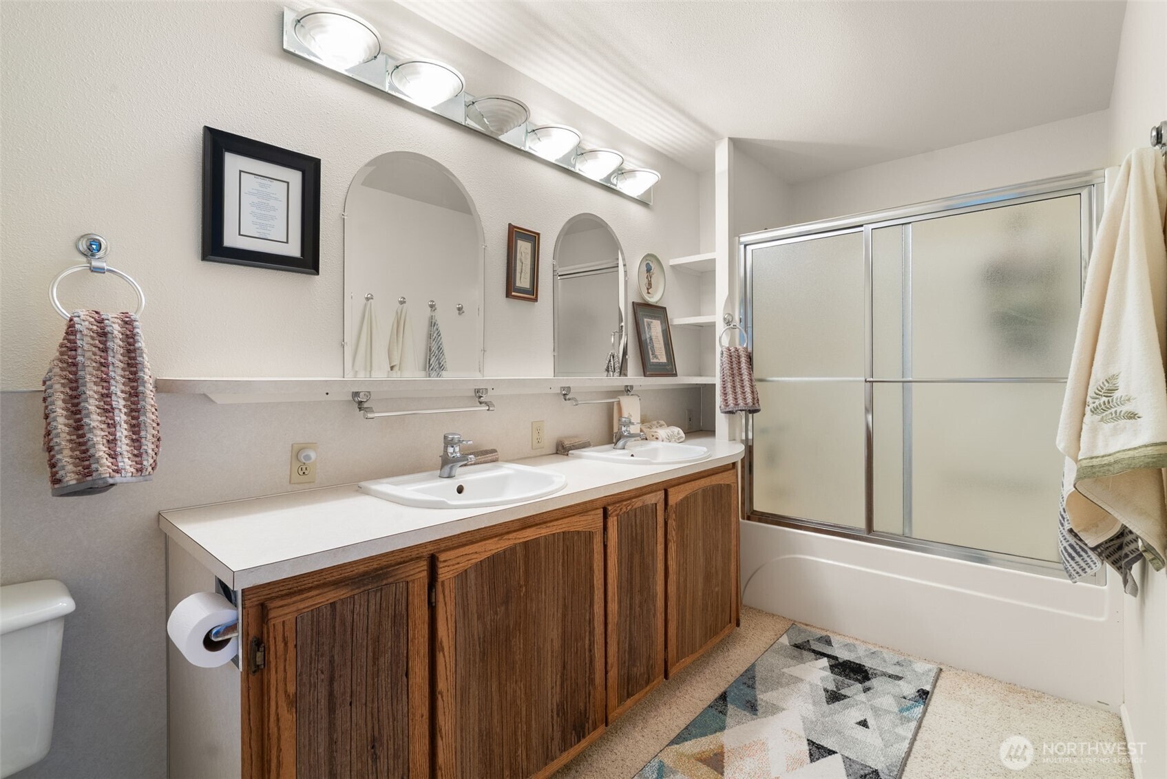 65 Wilderness Road Oakville, WA 98568 - Photo 12 of 40 a bathroom with a sink and a mirror
