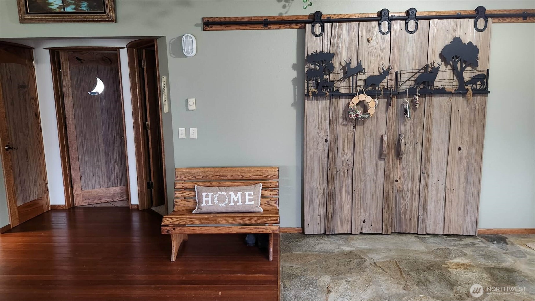 65 Wilderness Road Oakville, WA 98568 - Photo 13 of 40 a view of a hallway with wooden floor and a potted plant