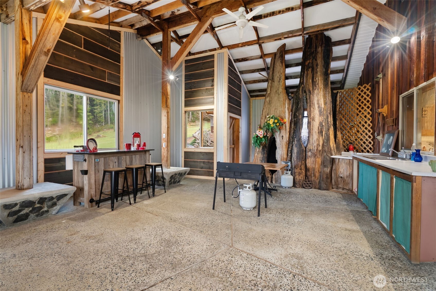65 Wilderness Road Oakville, WA 98568 - Photo 20 of 40 a view of a chairs and table in a patio