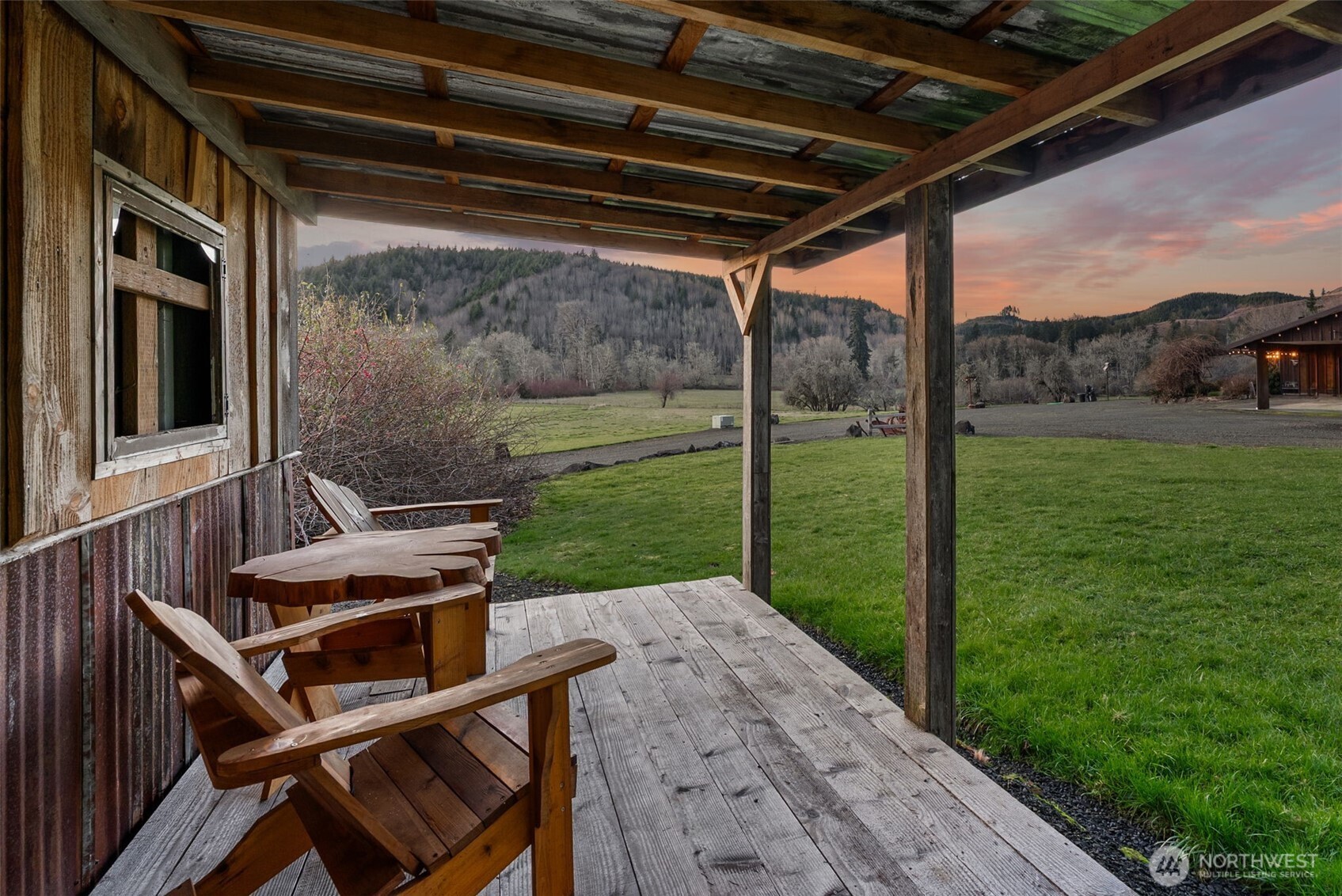 65 Wilderness Road Oakville, WA 98568 - Photo 26 of 40 a view of backyard with mountain view and a garden