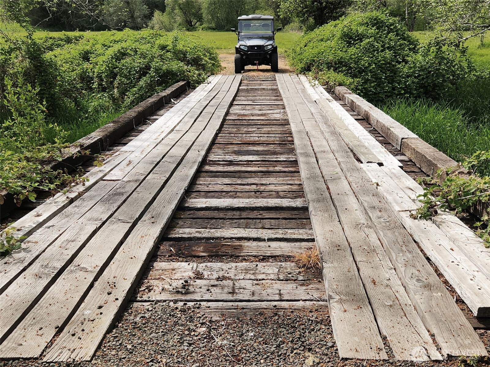 65 Wilderness Road Oakville, WA 98568 - Photo 33 of 40 a view of balcony with wooden floor and fence