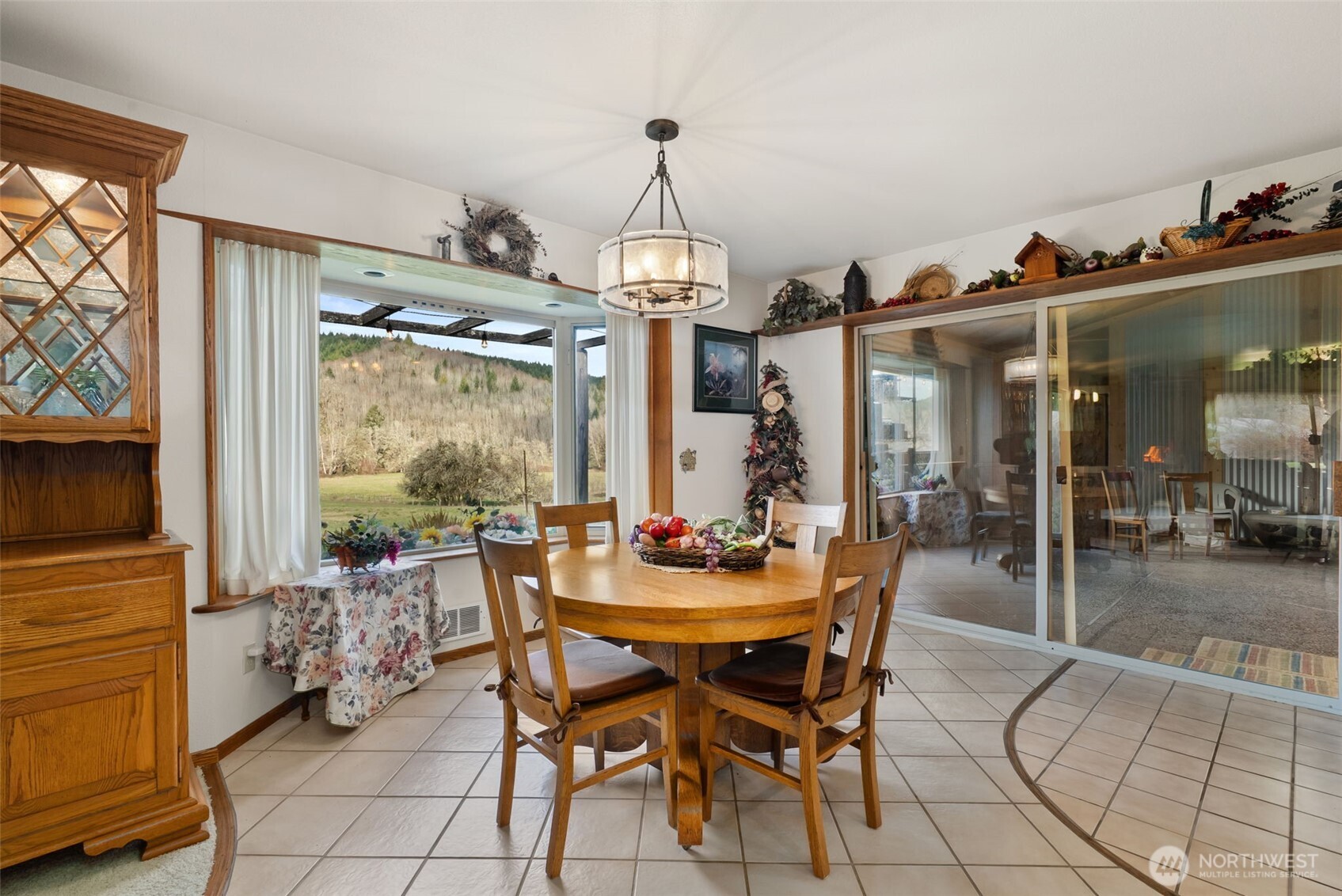 65 Wilderness Road Oakville, WA 98568 - Photo 10 of 40 a view of a dining room with furniture window and outside view