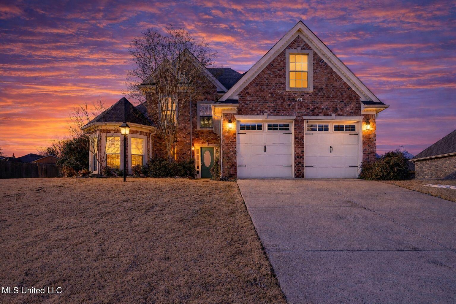 69 Lake Pointe Drive Hernando, MS 38632 - Photo 2 of 27 Front at Dusk
