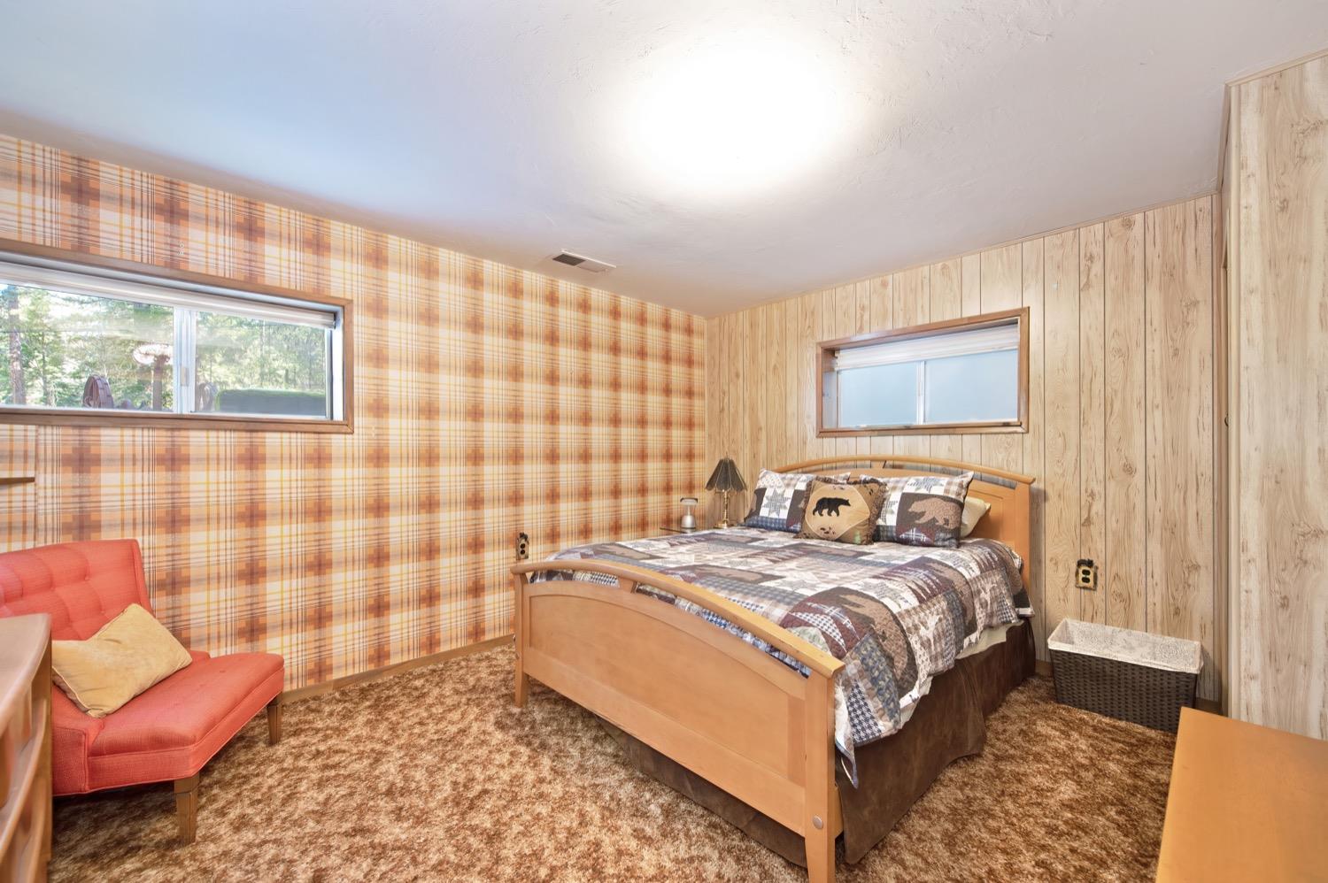 634 Alta Power House Road Alta, CA 95701 - Photo 25 of 38 a bedroom with a bed and a couch