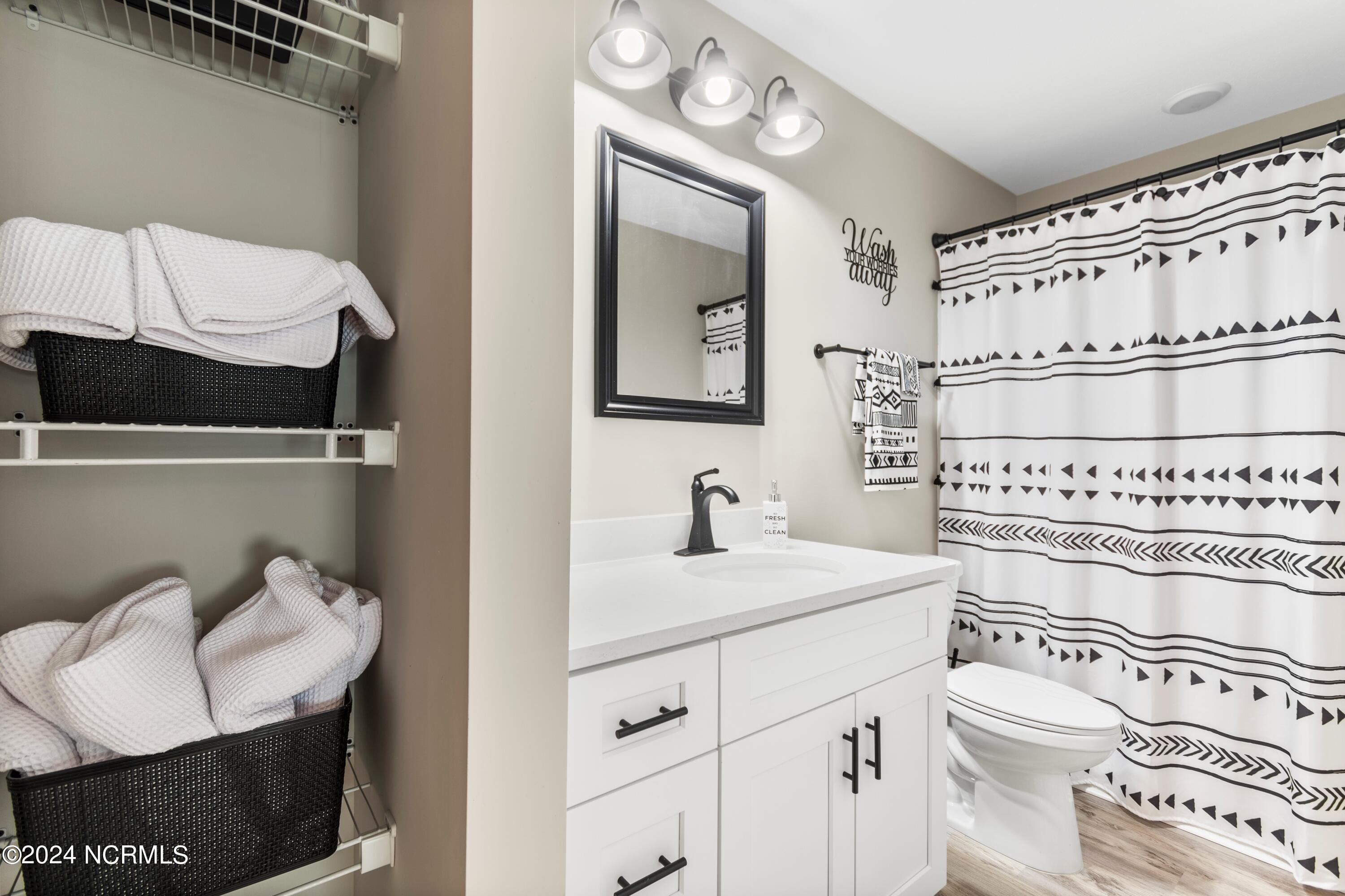 185 Boundary Loop Road Northwest Calabash, NC 28467 - Photo 27 of 56 Guest bathroom