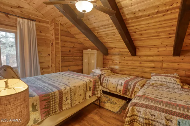 a view of a park with swings and slides