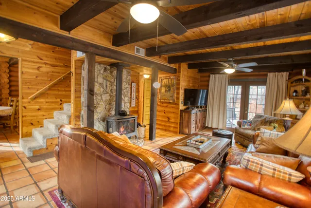 a kitchen with stainless steel appliances granite countertop a refrigerator and a stove