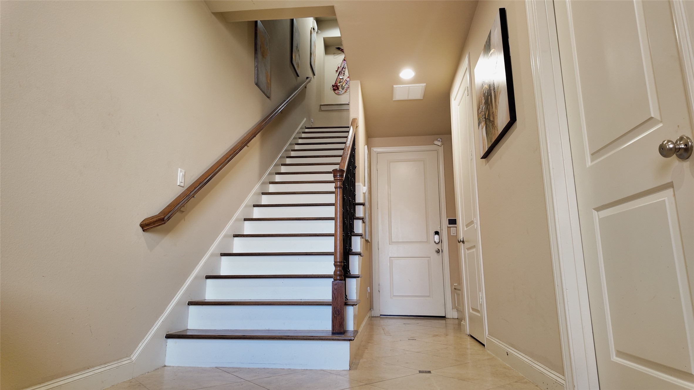 2029 Fannin Station North Houston, TX 77045 - Photo 4 of 14 a view of entryway and gallery with wooden floor