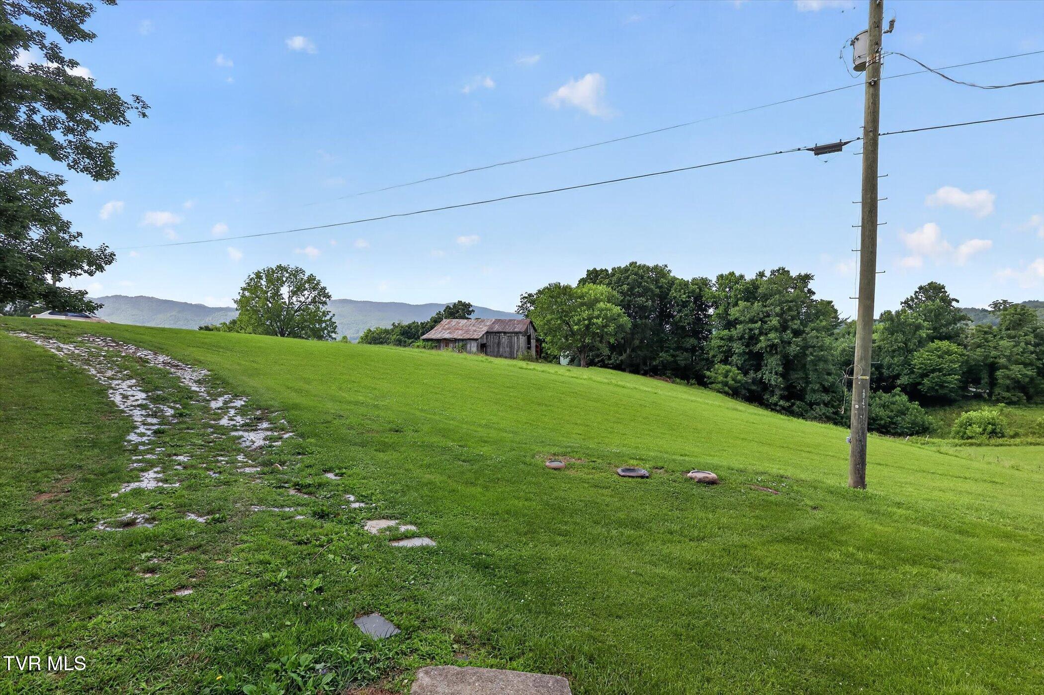 191 Dillard Avenue Erwin, TN 37650 - Photo 31 of 47 31-191-Dillard-Ave-WindowStill-Photograp