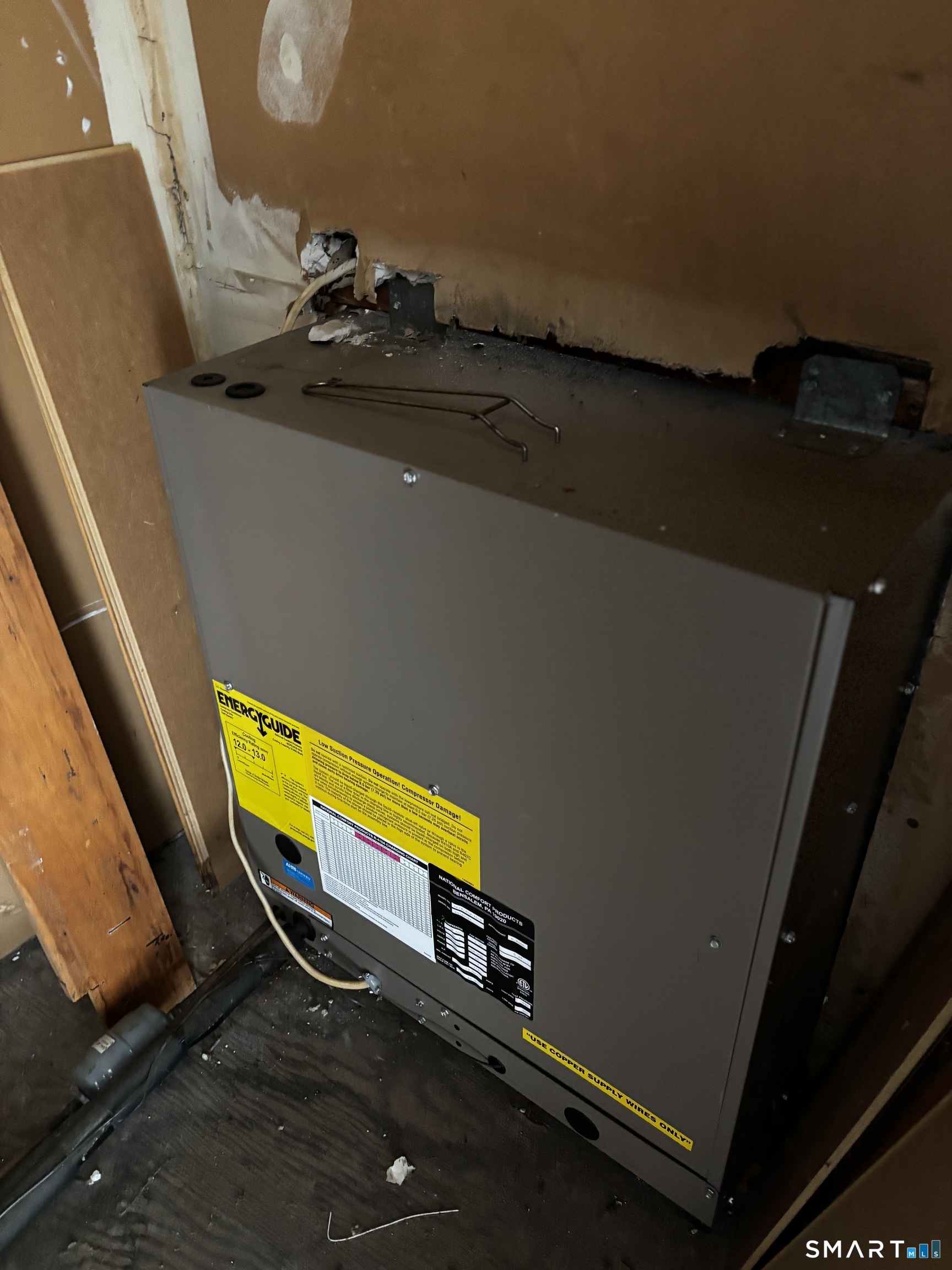 50 Greenhouse Road, Unit 33C Bridgeport, CT 06606 - Photo 33 of 33 a blue chair sitting next to a blue wall