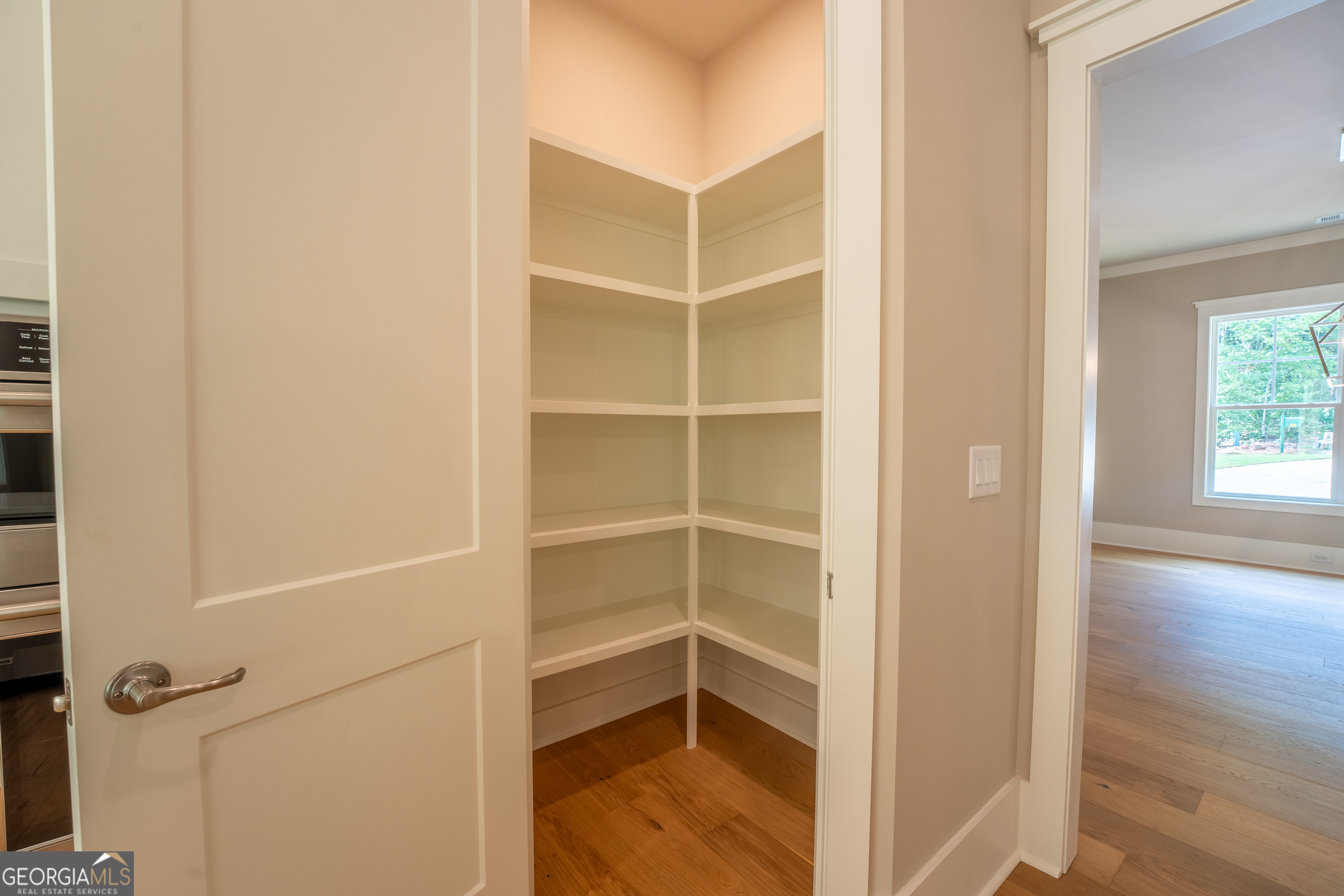 120 Fall Pippin Court Clarkesville, GA 30523 - Photo 16 of 65 a view of a room with wooden floor and a window