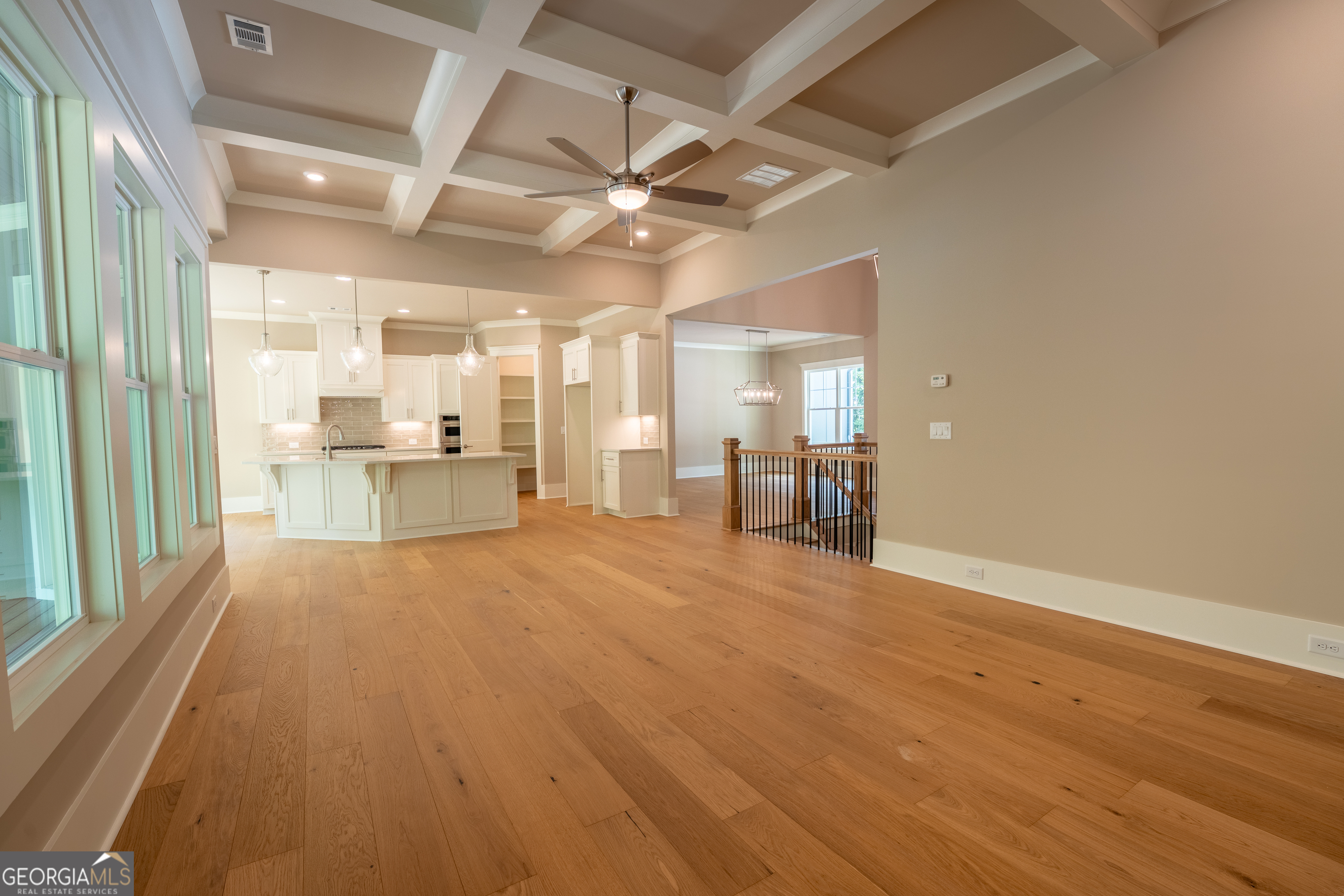 120 Fall Pippin Court Clarkesville, GA 30523 - Photo 18 of 65 a view of a livingroom with a furniture wooden floor and a ceiling fan