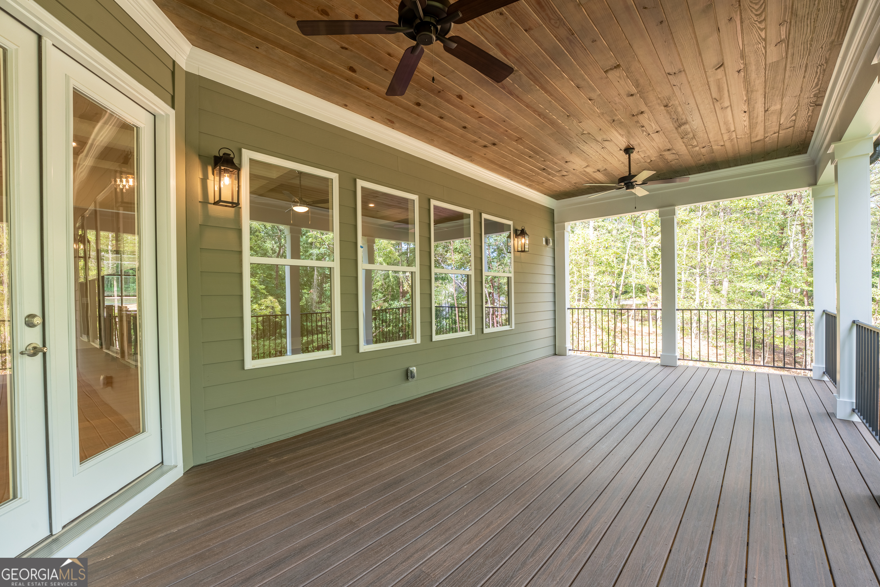 120 Fall Pippin Court Clarkesville, GA 30523 - Photo 20 of 65 a view of an empty room with wooden floor and a window