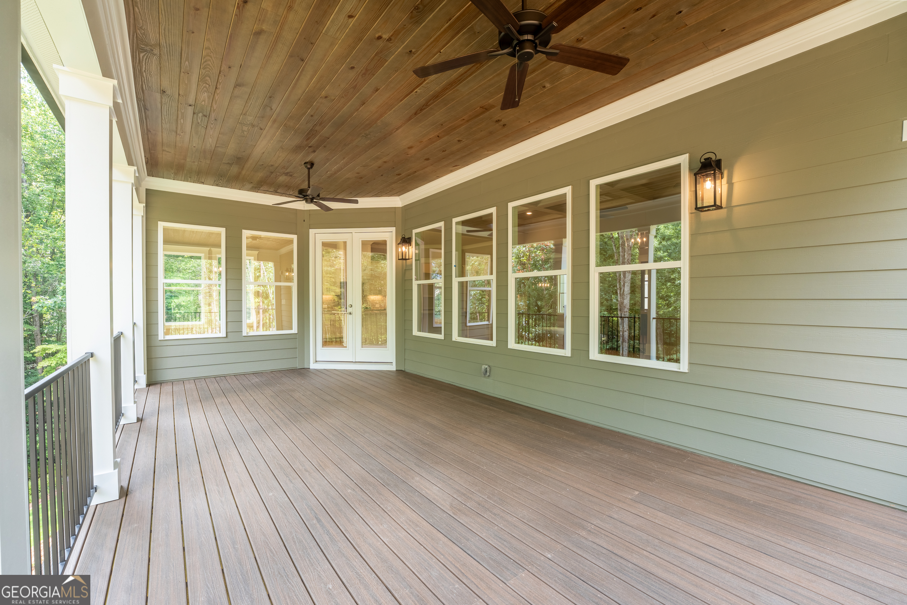 120 Fall Pippin Court Clarkesville, GA 30523 - Photo 21 of 65 a view of an empty room with a window and wooden floor