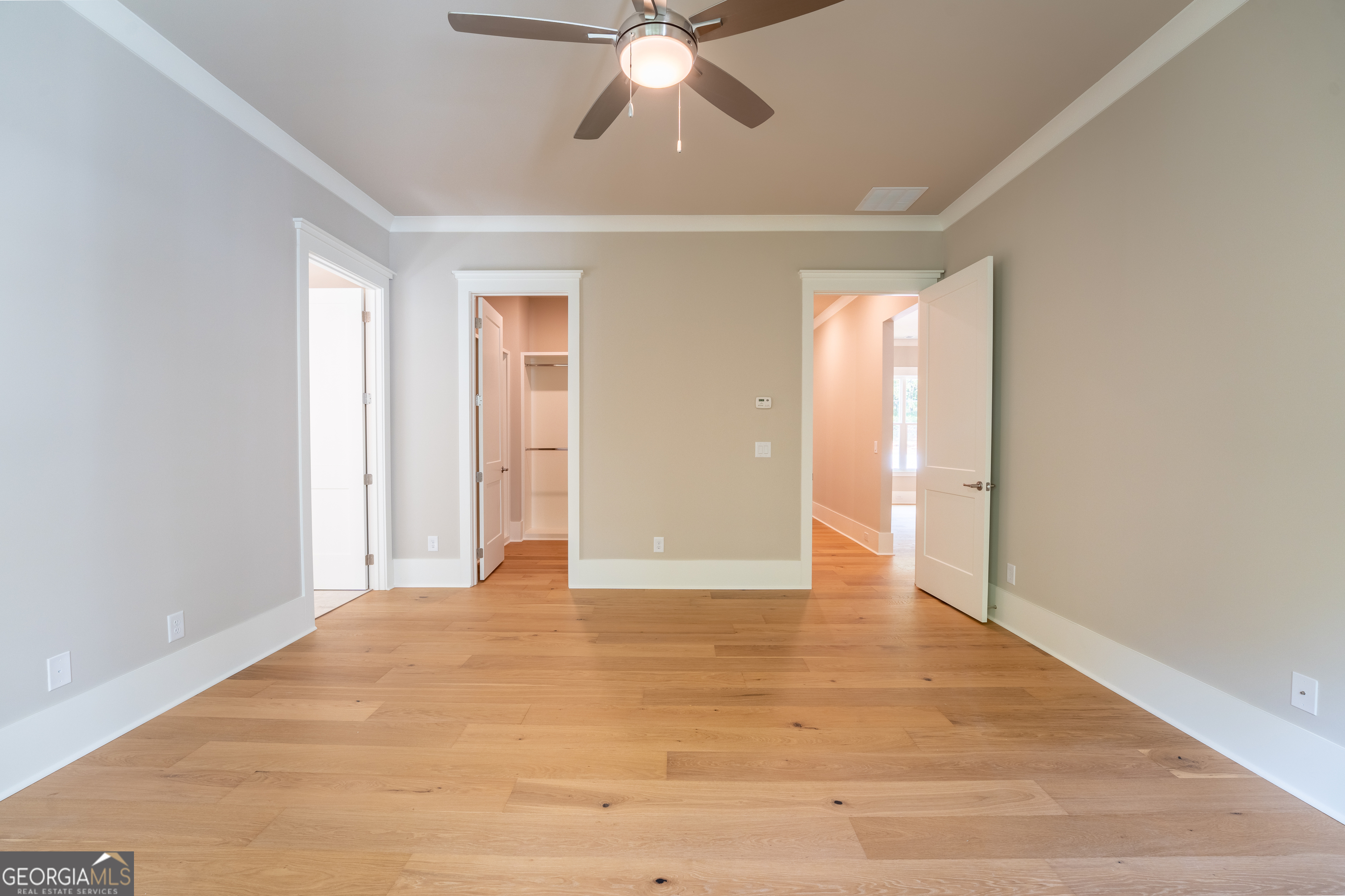 120 Fall Pippin Court Clarkesville, GA 30523 - Photo 31 of 65 a view of an empty room with window and wooden floor