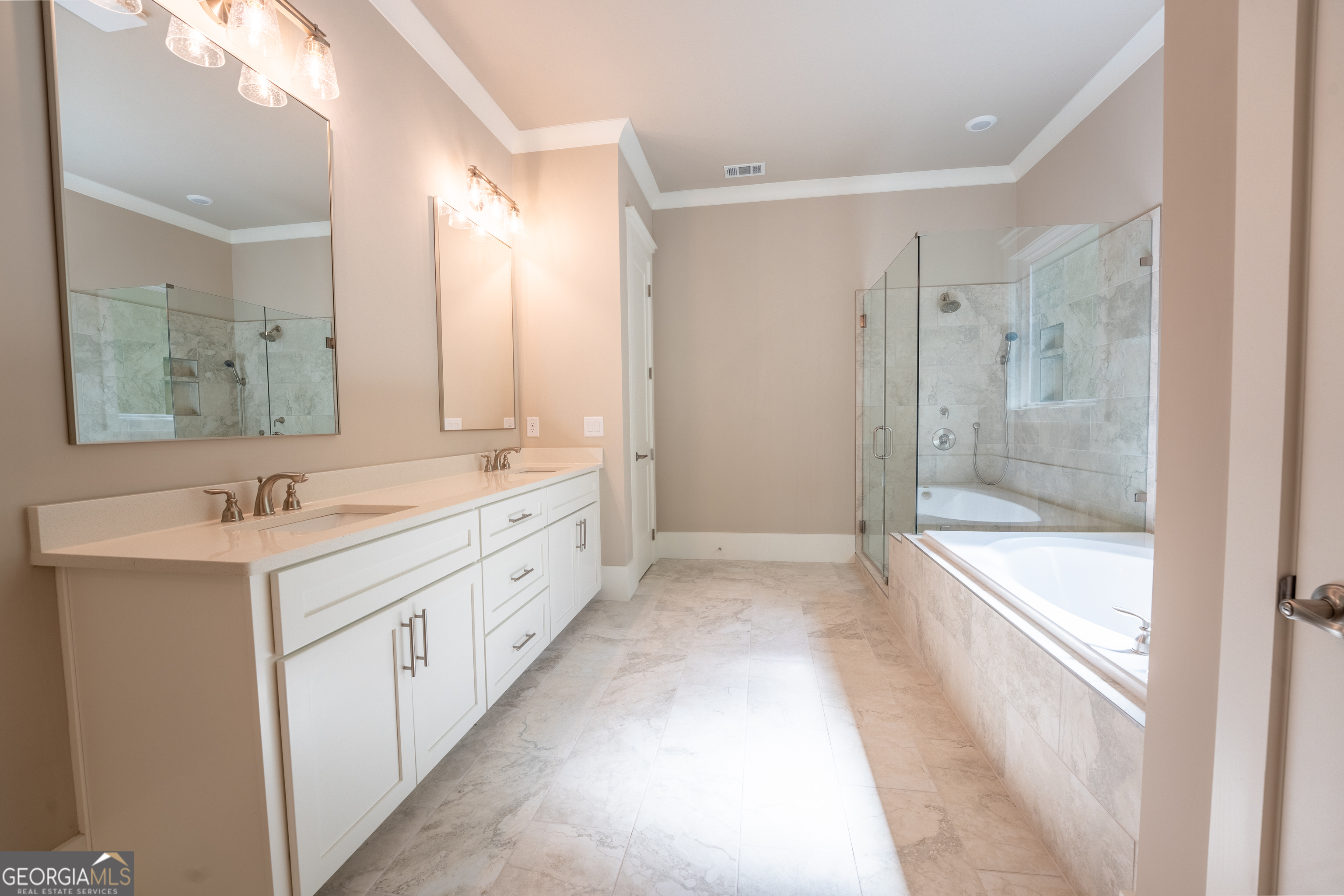 120 Fall Pippin Court Clarkesville, GA 30523 - Photo 34 of 65 a spacious bathroom with a bathtub shower sink and mirror