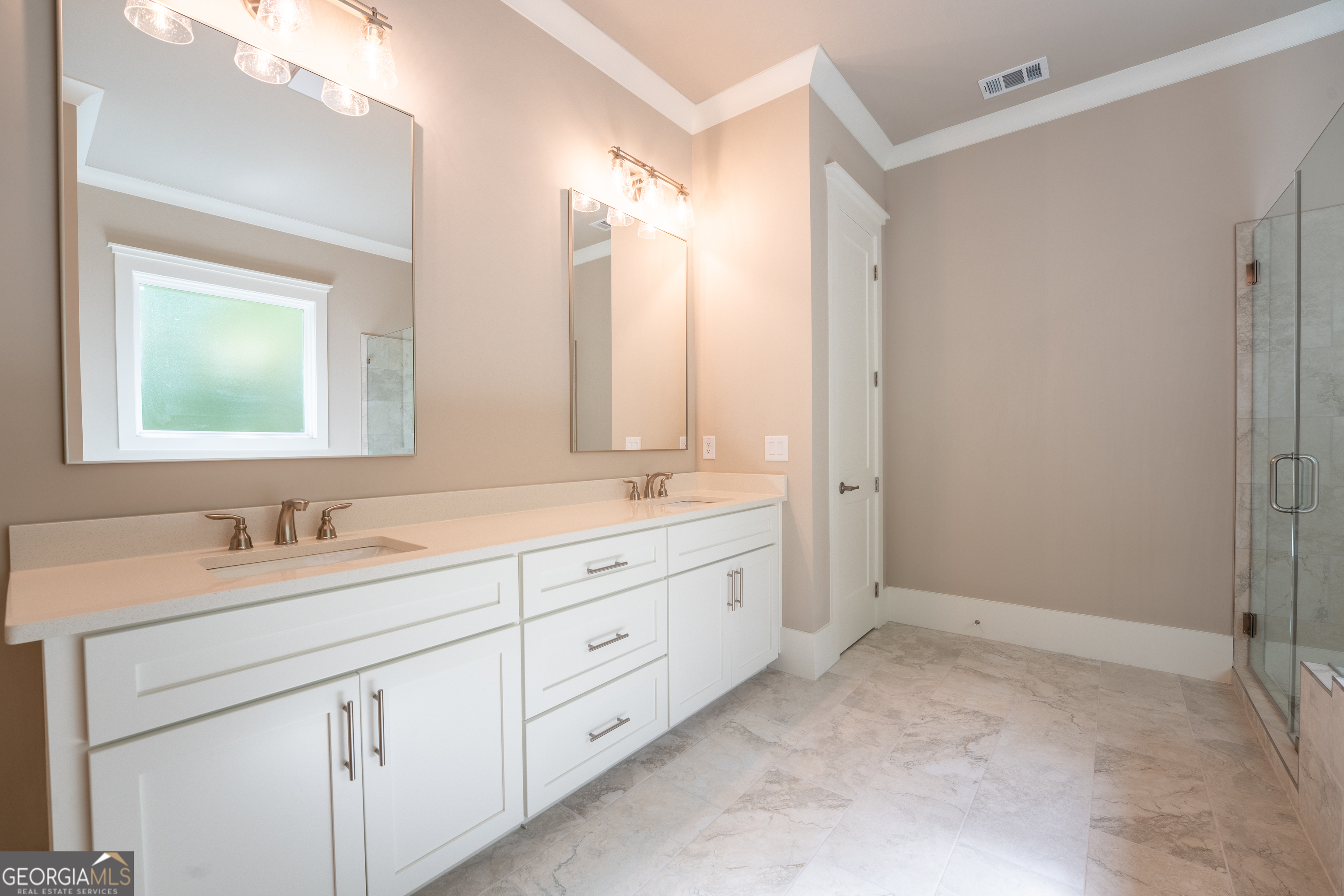 120 Fall Pippin Court Clarkesville, GA 30523 - Photo 35 of 65 a bathroom with double sink and a mirror