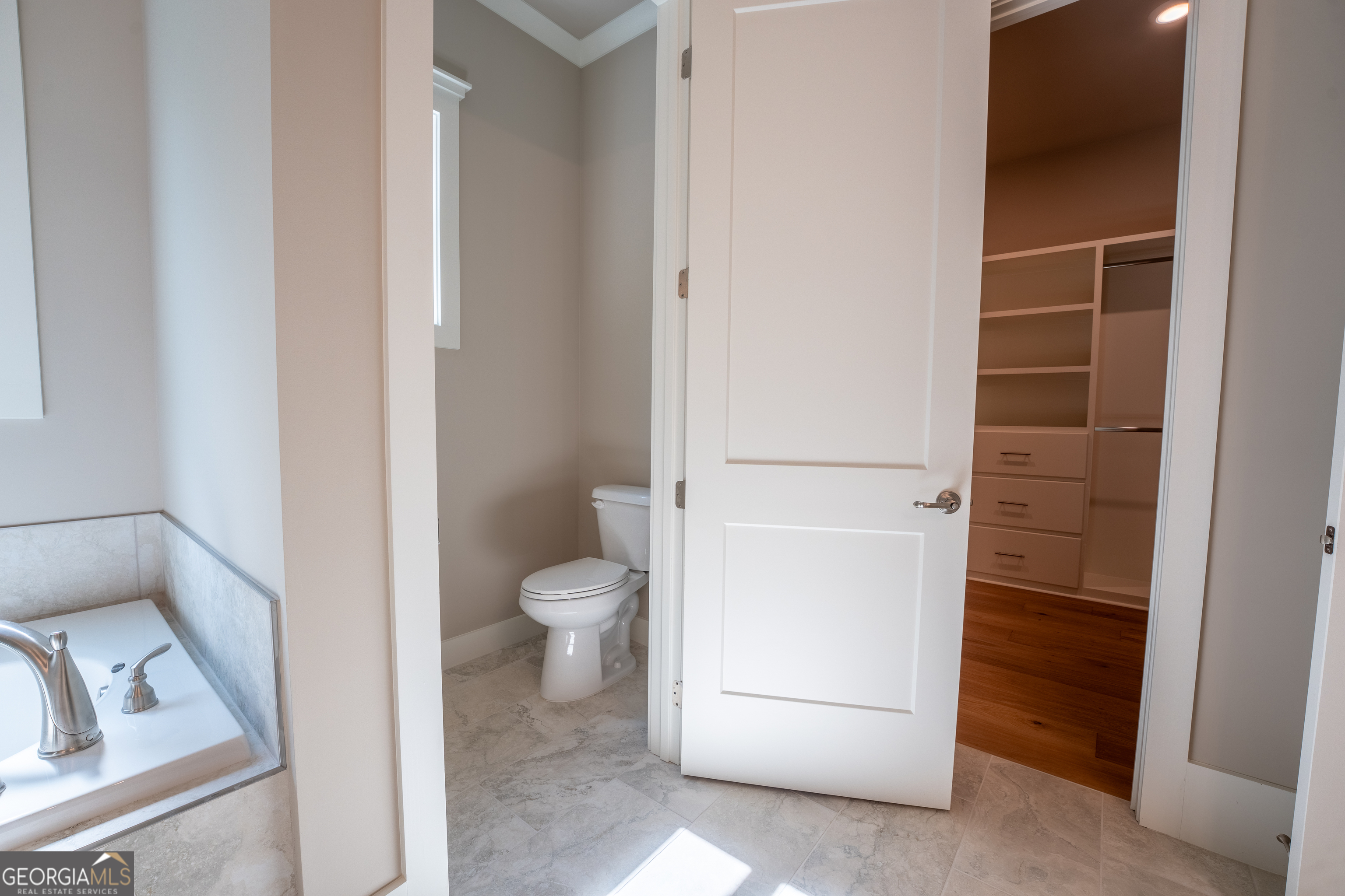 120 Fall Pippin Court Clarkesville, GA 30523 - Photo 48 of 65 a bathroom with a toilet and a sink