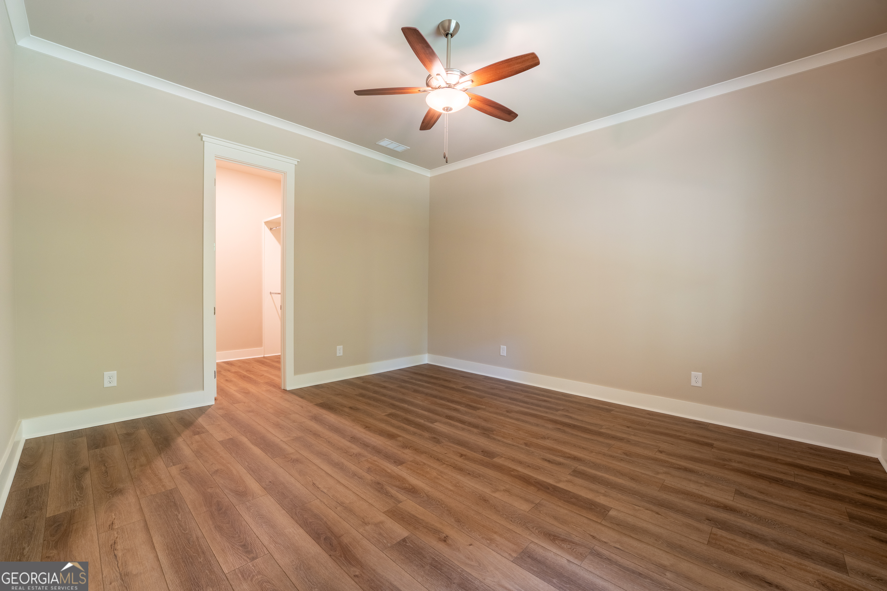 120 Fall Pippin Court Clarkesville, GA 30523 - Photo 50 of 65 a view of an empty room with window and wooden floor