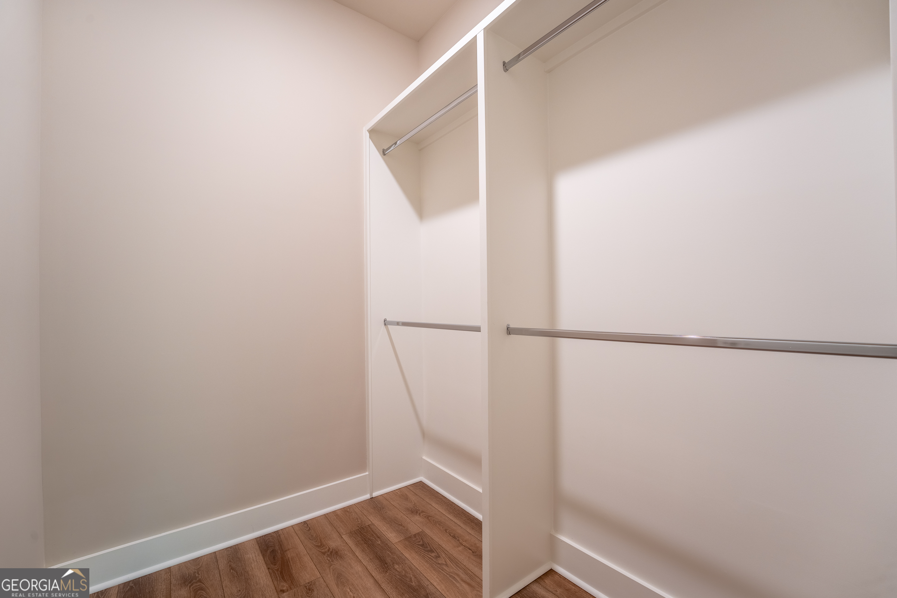 120 Fall Pippin Court Clarkesville, GA 30523 - Photo 51 of 65 a view of walk in closet with clothes