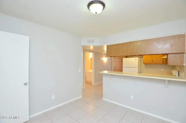 a view of a kitchen with a sink