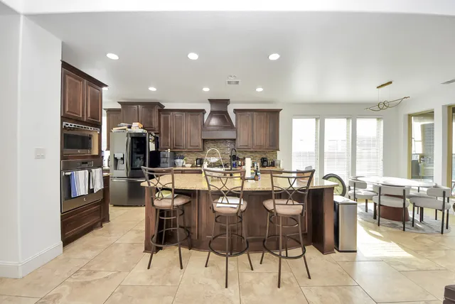 a large kitchen with lots of counter space and appliances